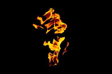 Real flames from underground gas isolated on black