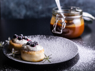 cheese cake with cream and berries caramel