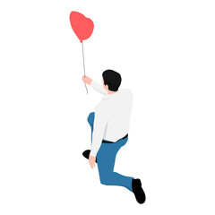 A man in a shirt and jeans holding a heart-shaped balloon. The man got down on one knee and holding a balloon in his hand. 