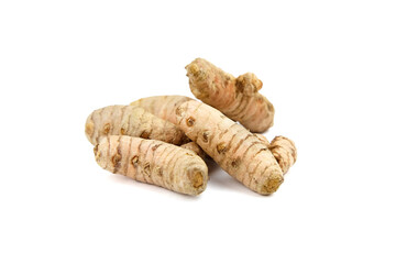 Turmeric spice rhizome isolated on white background. Heap of curcuma longa roots