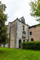 Fototapeta na wymiar Old monastery of Santa Clara nuns in the town of Azkoitia next to the Urola river. Founded by Don Pedro de Zuazola, Gipuzkoa. Basque Country