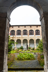 Fototapeta na wymiar Inner courtyard of the old Santa Clara Monastery in the town of Azkoitia next to the Urola river. Founded by Don Pedro de Zuazola, Gipuzkoa. Basque Country