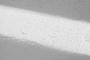 White background kink shape. Foam plastic Styrofoam texture