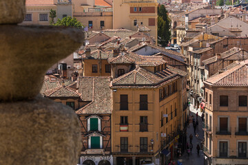 General view from the Aqueduct of Segovia, of the traditional houses in the central street of San Francisco
