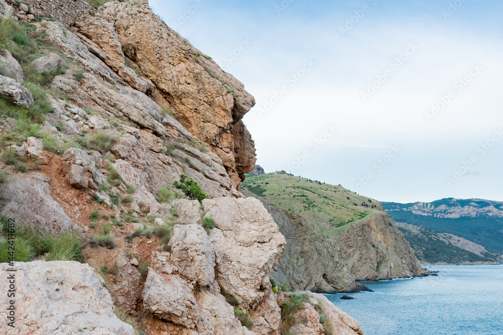 Wall mural rock in the sea bay. sea bay rock view. landscape of sea bay