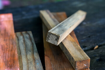 Wet wooden blocks close up background