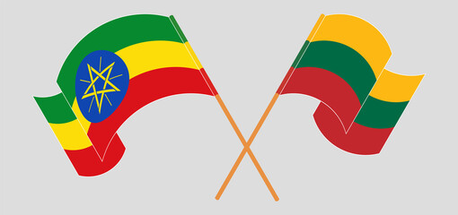 Crossed and waving flags of Ethiopia and Lithuania