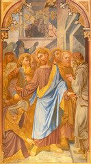 Obraz premium VIENNA, AUSTIRA - JUNI 24, 2021: The fresco of Christ and the Woman with the Issue of Blood in the Votivkirche church by brothers Carl and Franz Jobst (sc. half of 19. cent.).