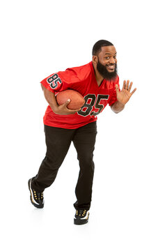 Fan: Football Man Holds Ball In Running Pose