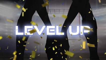 Animation of the words level up in white over rugby player silhouette on pitch with gold confetti - Powered by Adobe