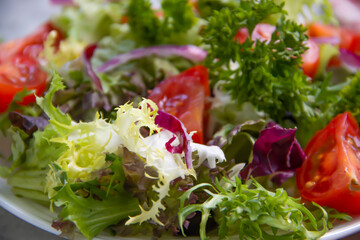 fresh vegetable salad on concrete background