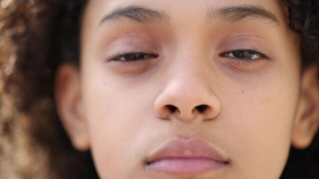 Hispanic latin south american girl child macro close-up face
