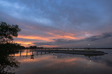 Obraz premium Little island in Navarro Lagoon -a little town of Buenos Aires Province, Argentina- at sunset. It is a common tourristic destination in the summer. 