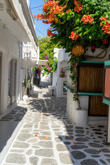 Paros, Greece. Traditional whitewashed dotted alley in old city, Cyclades Greek Islands.