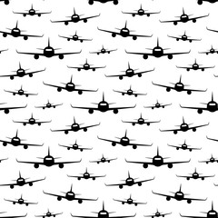 Black passenger aircraft isolated on white background. Front view. Monochrome seamless pattern. Vector simple flat graphic illustration. Texture.