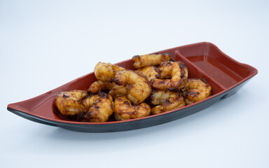 Shrimp on red boat with white background