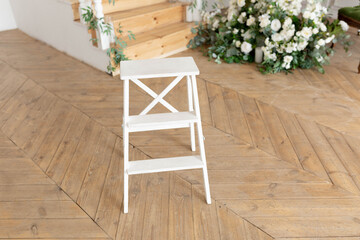 wooden staircase. stool ladder. wooden stool. stepladder for height. stool with step