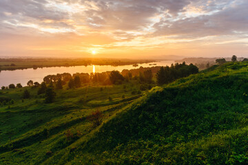 Fototapeta premium sunset over the river