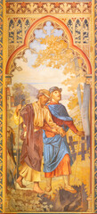 VIENNA, AUSTIRA - JUNI 24, 2021: The fresco of the parbale about two blinds in the Votivkirche church by brothers Carl and Franz Jobst (sc. half of 19. cent.).
