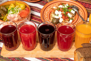 set of juices in a glass