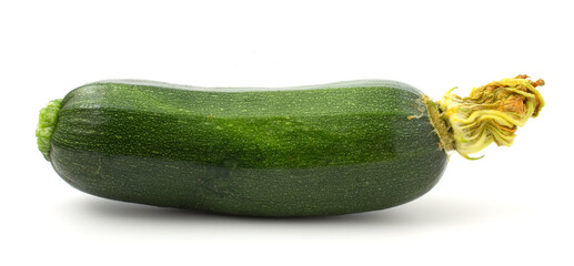 Green young zucchini isolated on white background. Nutritious vegetable with vitamins.