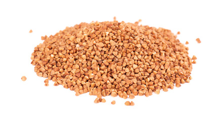Roasted buckwheat grains, isolated on white background. Dry brown buckwheat groats.