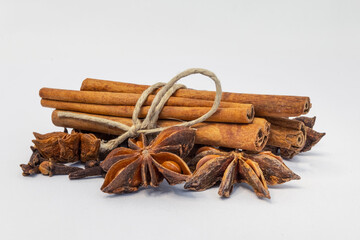 marco and detailed photo of cinnamon and anise isolated on a white background. spices.