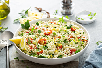 Tabbouleh salad with cauliflower rice and vegetables - obrazy, fototapety, plakaty