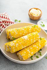 Cooked corn on the cob with salt and butter