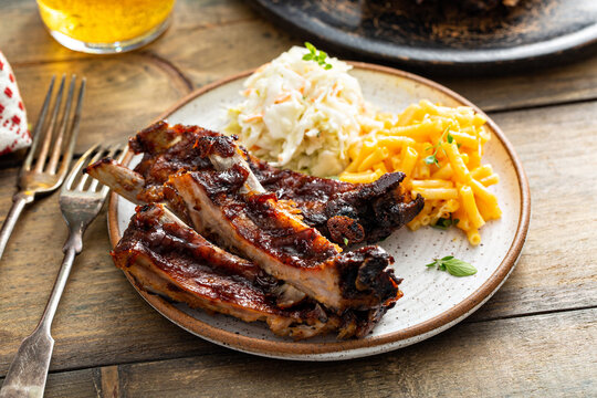 Barbeque Meal With Ribs And Side Dishes