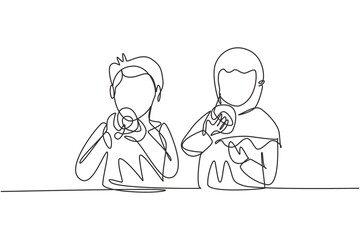 Single one line drawing two Arabian boy and girl having donuts meal with hand around table. Enjoy breakfast at home. Tasty and healthy food. Continuous line draw design graphic vector illustration