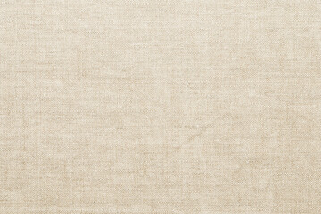 Linen fabric texture background. Natural champagne beige cloth surface closeup