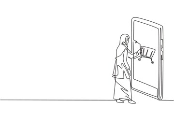 Single continuous line drawing young Arab woman shopping through smartphone screen with shopping cart. E-commerce, digital lifestyle concept. Dynamic one line draw graphic design vector illustration