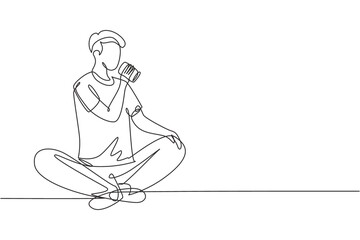Obraz na płótnie Canvas Single continuous line drawing young man sitting while enjoying a soft drink to refreshing and relaxing body. Attractive teenager concept. Dynamic one line draw graphic design vector illustration