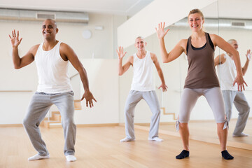Group of multinational activity people practicing dance techniques