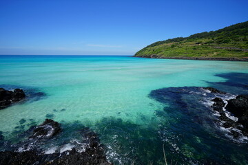 Fototapeta na wymiar a beautiful seaside landscape with clear water, scenery around hamdeok beach
