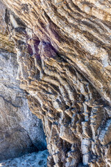 Close up of a rock formation on the shoreline of Portuguese Beach in Mendocino Headlands State Park, California