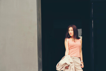 Fototapeta premium Beautiful Woman Going To Work With Walking Near Office Building.