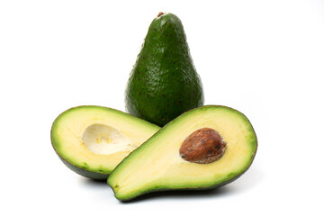 Avocado whole fruit and slices, isolated on a white background