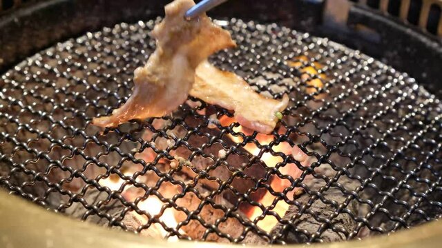 Charcoal-grilled meat with pork roses