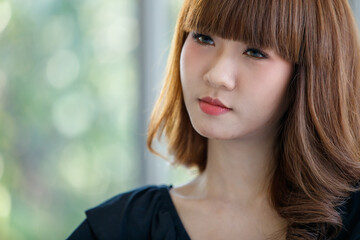 Obraz premium Asian woman smile to camera..