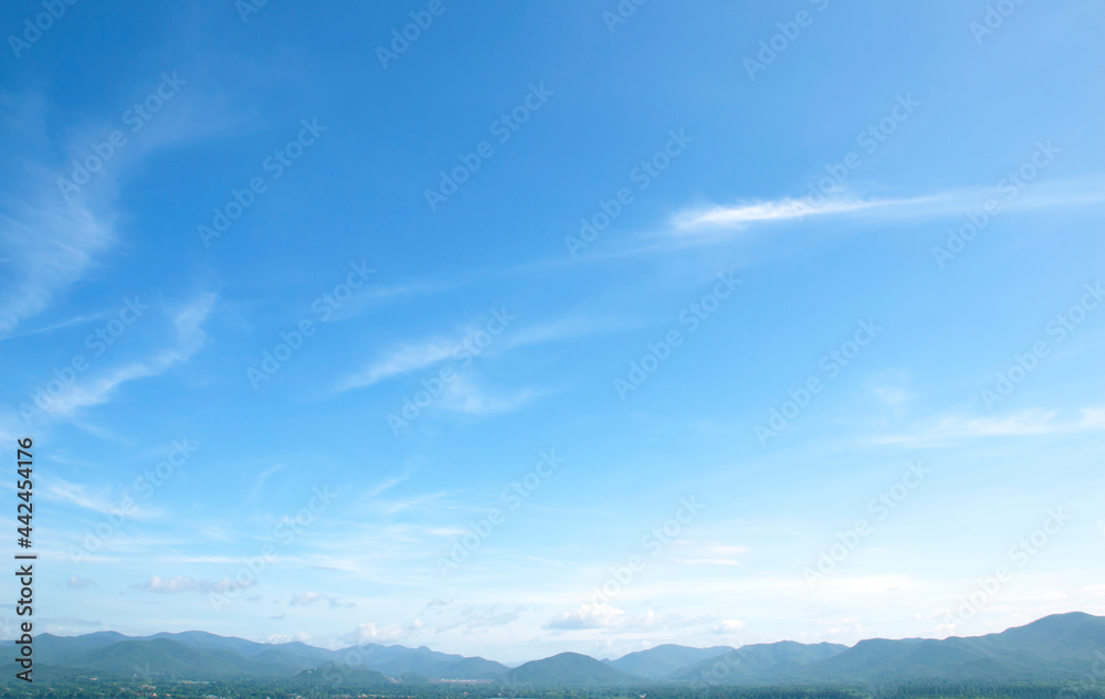 Wall mural blue sky background and white clouds soft focus