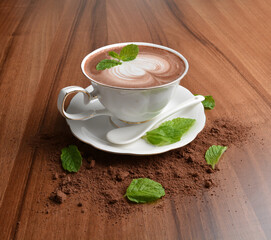 hot chocolate cafe mocha drink with mint leaf in beautiful England white cup hot coffee beverage menu