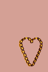 Omega 3, on a pink background