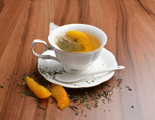 hot melon and peach fruit tea bag drink in beautiful England design white cup hot healthy beverage menu