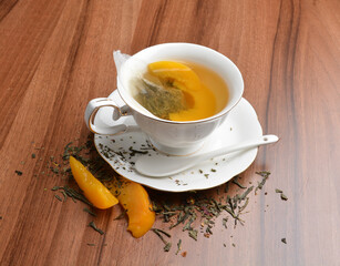 hot melon and peach fruit tea bag drink in beautiful England design white cup hot healthy beverage menu