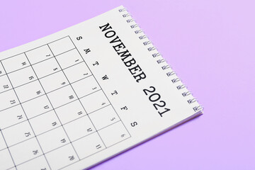 Flip paper calendar on color background