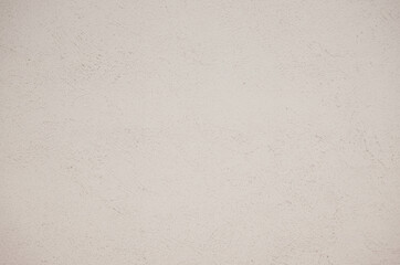 Abstract white or ivory cement wall texture. Rough finish plaster stucco background