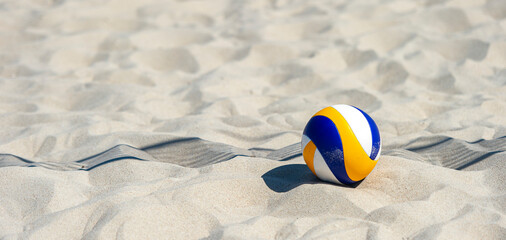 Beach volleyball ball on the sand beach. Team sport concept - Powered by Adobe