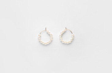 Beautiful earrings on white background